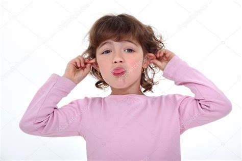 Little Girl Pulling Funny Face — Stock Photo © Photography33 10156427