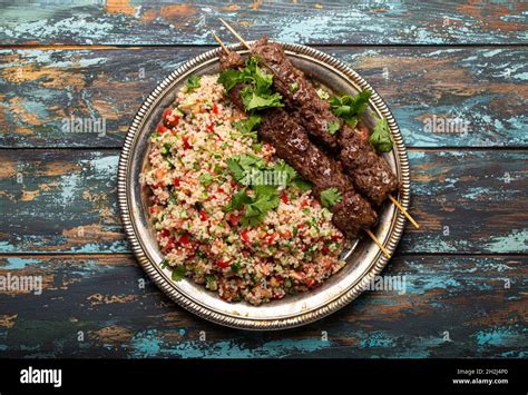 Arab Turkish kebab with tabbouleh salad Stock Photo - Alamy