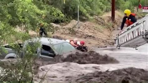 Three People Rescued From Flash Flooding In Arizona As Car Submerged In