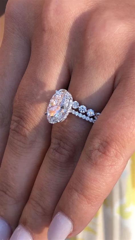 Stunning Carat Oval Engagement Ring Paired With A Custom Diamond