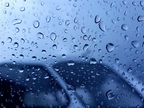 Premium Photo Raindrops On Glass Window