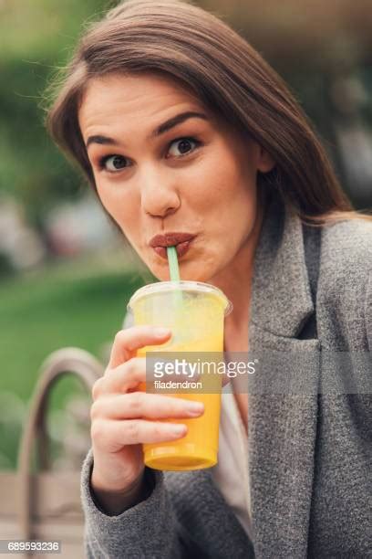 Person Drinking Slushie Photos And Premium High Res Pictures Getty Images