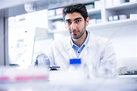 Lab Assistant Using Mini Centrifuge Stock Image F020 3339 Science