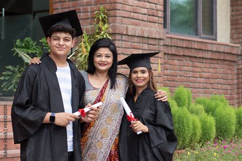 Happy Indian University Student And Proud Mother Celebrating Graduation