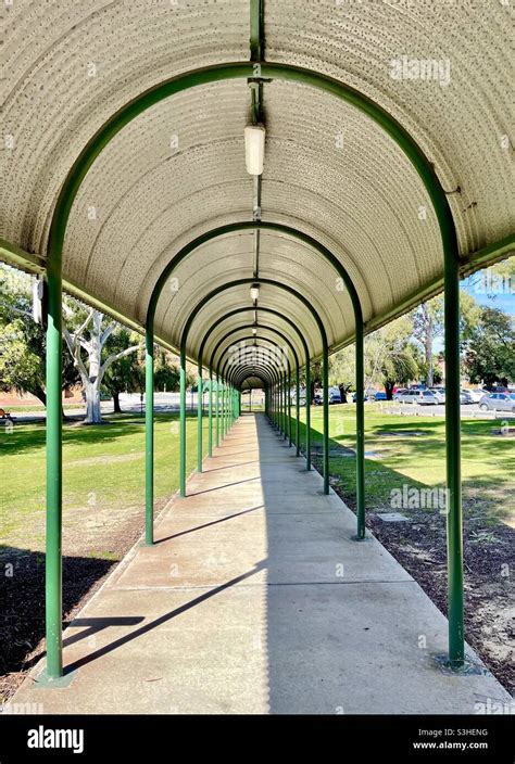 Curved covered walkway Stock Photo - Alamy