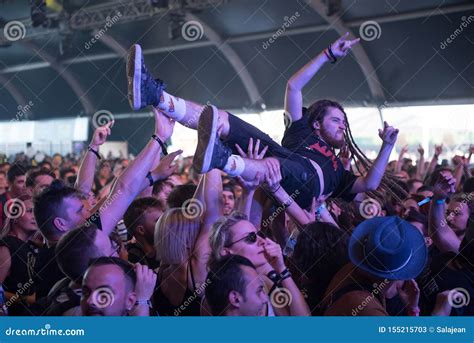 Guy Doing Crowd-surfing at Rock Concert Editorial Stock Photo - Image