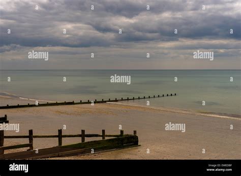 Moody sky over Felpham Beach Stock Photo - Alamy