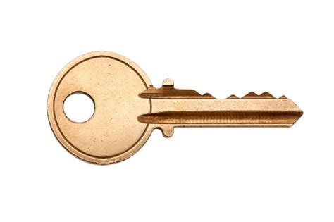 A Blank Brass Key Against A White Background Stock Photo Download