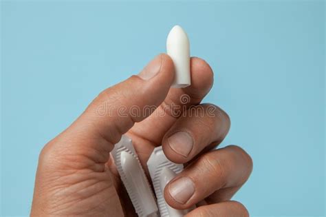 Suppository For Anal Or Vaginal Use In The Hands Of A Man Candles For