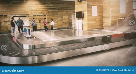 Baggage Claim In Airport Terminal Suitcases On The Airport Luggage