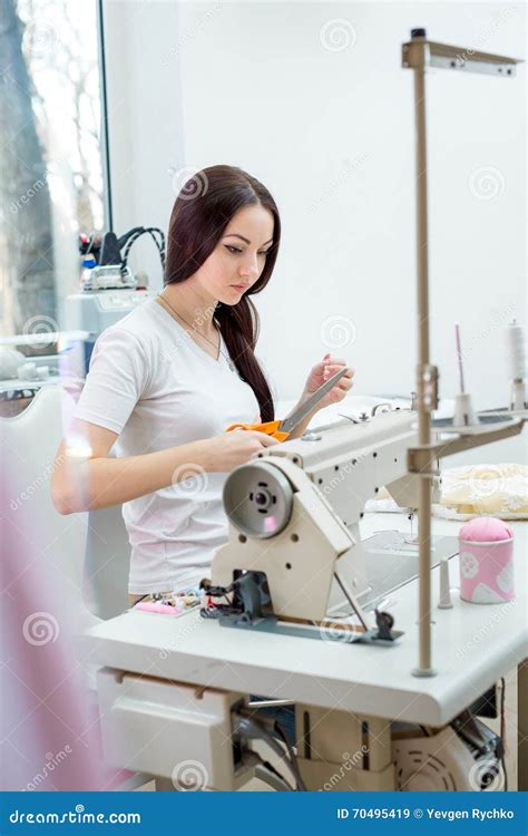 Girl Seamstress Sew On The Sewing Machine Stock Image Image Of