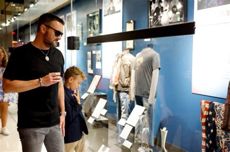 Photos Eric Church Takes Walk Down Memory Lane With His Two Sons At