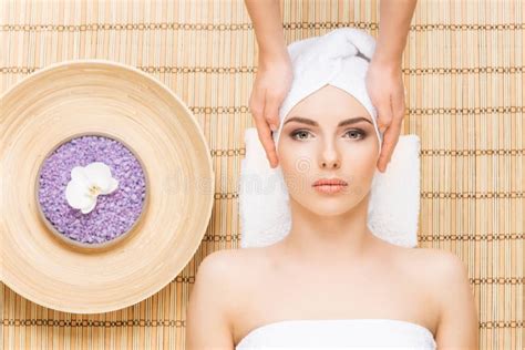 Beautiful Young And Healthy Woman On Bamboo Mat In Spa Salon Ha Stock