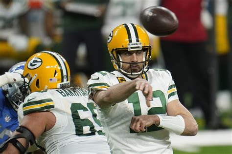 Rodgers Led Packers Beat Lions 31 24 Clinch Nfc North Title Ap News