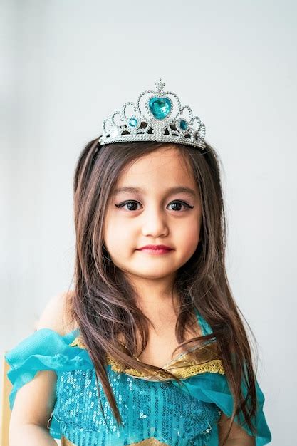 Premium Photo Portrait Of A Smiling Girl Wearing Tiara And Princess