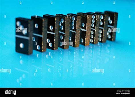 Dominoes Are Lined Up In A Row Stock Photo Alamy