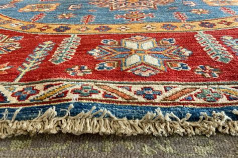 An Oval Oriental Rug For Any Dining Room David Tiftickjian And Sons