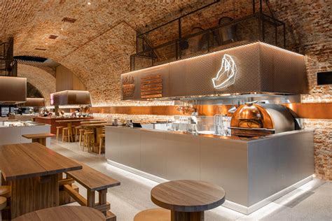 NOKE Architects Crafts an Intoxicating Food Hall in a Historic Warsaw Brewery - Interior Design