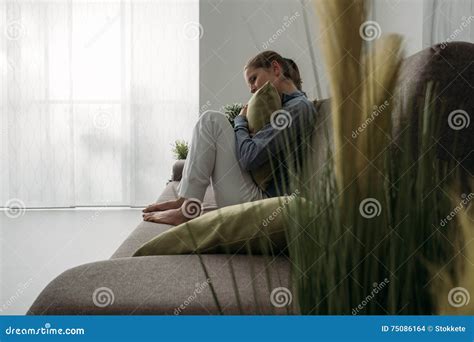 Sad Woman Hugging A Pillow Stock Photo Image Of Cuddling 75086164