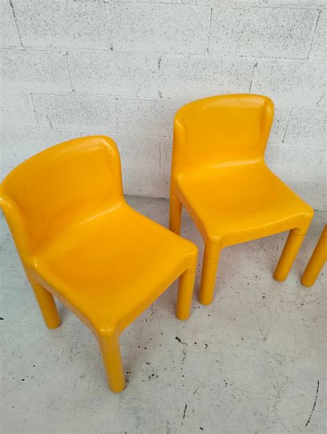 Yellow Model Chairs By Carlo Bartoli For Kartell Set Of