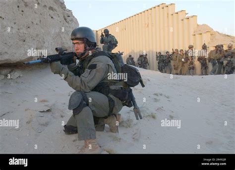 US Navy Naval Special Warfare team members conduct a training operation ...