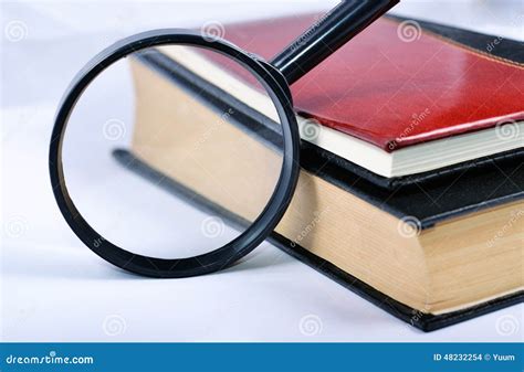 Magnifying Glass with Books Stock Photo - Image of archives ...