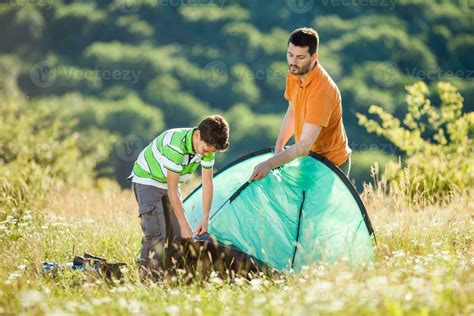 Father and son camping 23939226 Stock Photo at Vecteezy