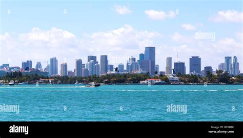 View on Miami city skyline from Miami Beach waterfront. Sailboats ...