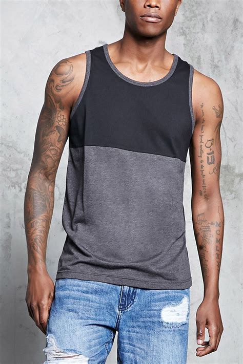 A Knit Tank Top Featuring A Heathered Colorblock Panel Along The Lower