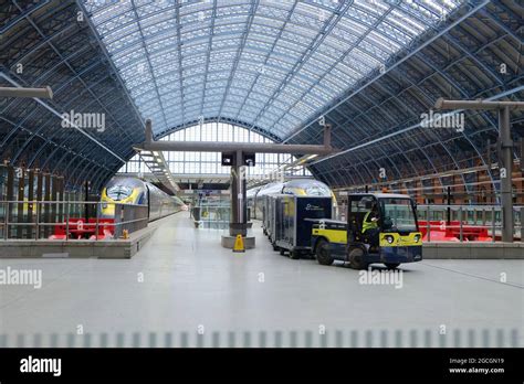 Two Eurostar Trains On The Platform At St Pancras International As A