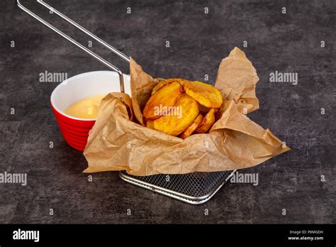 French fried potato with sauce Stock Photo - Alamy