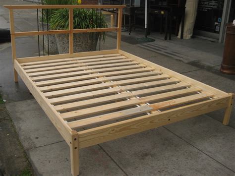 UHURU FURNITURE & COLLECTIBLES: SOLD - Queen Pine Platform Bed Frame - $90