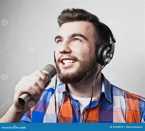 Young Man Holding A Microphone Stock Photo Image Of Rock Music 53448818