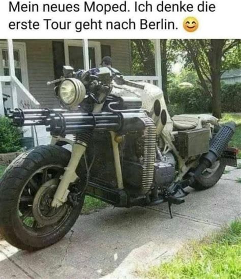 An Old Motorcycle Is Parked In Front Of A House With The Caption Men