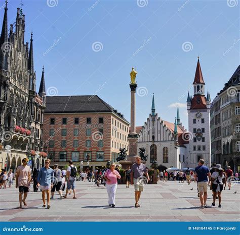 Munich Downtown in Marienplatz with Tourists & Shoppers Editorial Image