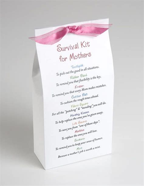 A White Box With A Pink Ribbon On It That Says Survival Kit For Mother S