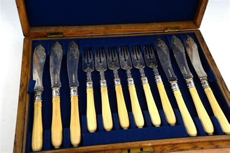 Antique Set Of Twelve Victorian Silver And Ivory Handled Fish Knives