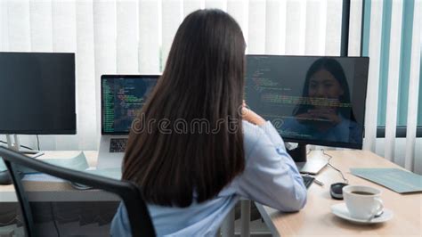 Asian Woman Programmer Typing Source Code With Computer Pc For