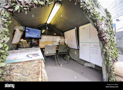 Mobile Military Command Centre Set Up On A Camouflaged Tent Stock