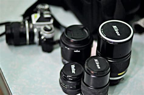 Four Black Nikon Zoom Camera Lens · Free Stock Photo