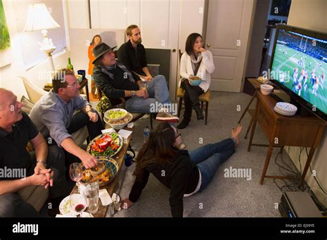 People watch superbowl tv hi-res stock photography and images - Alamy