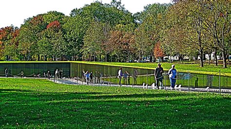 The Wall of the Vietnam War Memorial in Washington DC Photograph by ...