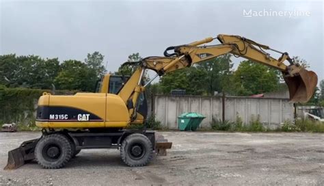 Caterpillar M C Wheel Excavator For Sale Latvia Klives Zp