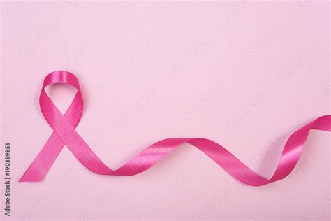 Pink Ribbon Breast Cancer On Pink Background With Copy Space Stock