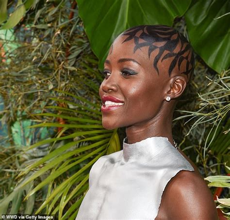 Actress Lupita Nyongo Flaunts Her Boobs In Breastplate Moulded From