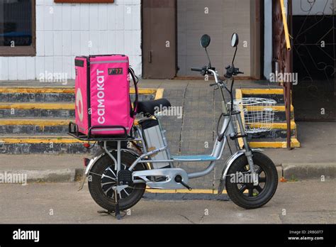 Moscow, Russia - July 9. 2023. Scooter with a Samokat bag - food and ...