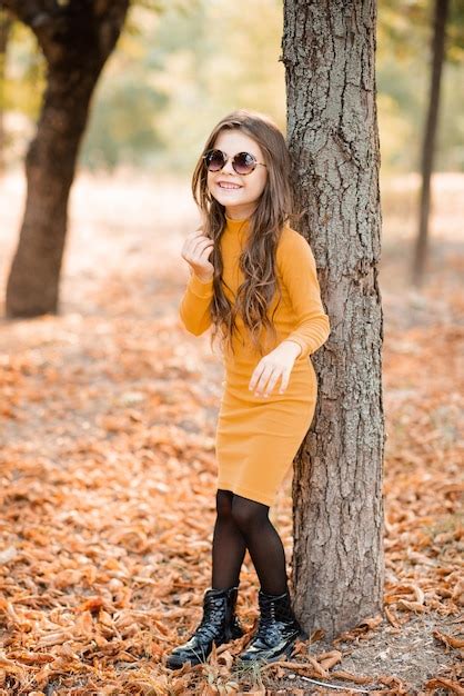 Premium Photo Smiling Child Girl 4 5 Year Old Wear Yellow Knit Trendy