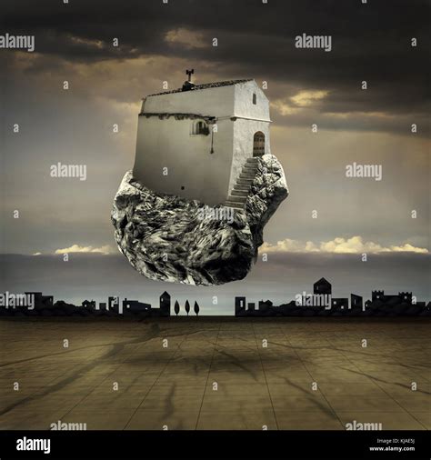 Surreal Landscape With A Flying House On A Rock Stock Photo Alamy