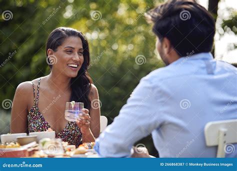 Couple Eating Outdoor Meal In Garden At Home Together Stock Image Image Of Dinner Meal 266868387