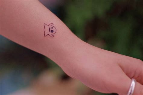 Tiny Ghost Tattoo Done On The Wrist Minimalistic